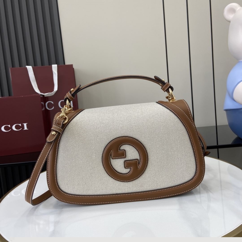 G*u*i top handle bags